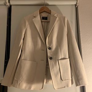 Delicate, soft, and sophisticated tan/nude blazer.